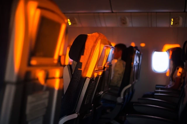 Flight Itinerary for Visa Application Guide – Airplane Cabin View